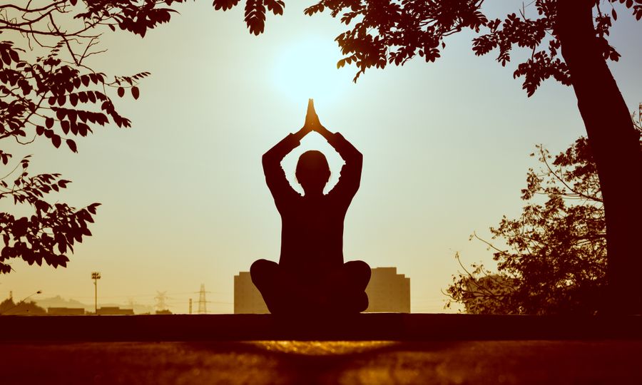 Sunrise vinyasa yoga silhouette